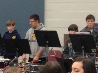 Nick Mier and Ryan Bellinger (2nd and 4th from left) lead the Percussion Section